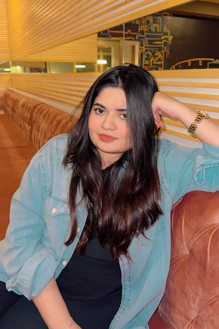 Noor Fatima in a denim shirt